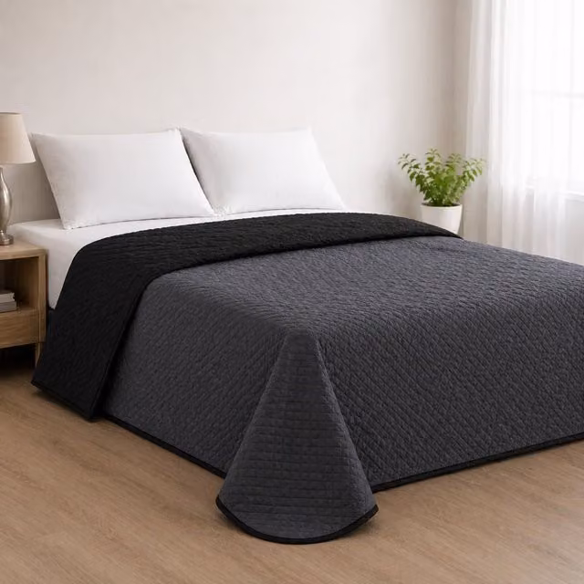 Colcha reversible acolchada Donegal Collections bicolor antracita y negro para cama de 180 cm