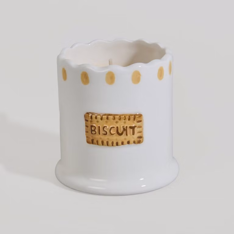 Vela votiva de cerámica Maisons du Monde con aroma gourmand en colores blanco y marrón