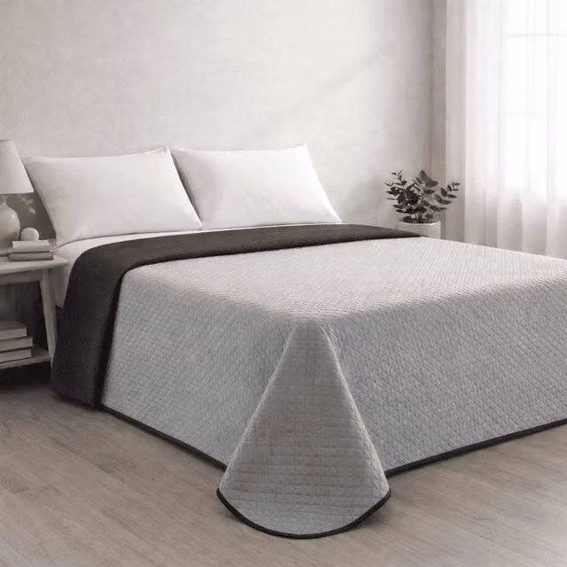 Colcha reversible acolchada Donegal Collections en gris y antracita para cama de 105 cm