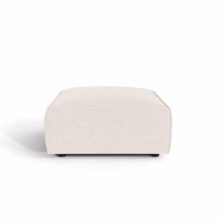 Puf de terciopelo SIA en color beige con diseño de cubo moderno