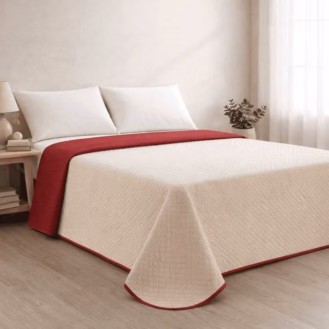 Colcha reversible acolchada Donegal Collections bicolor beige y rojo para cama de 90 cm