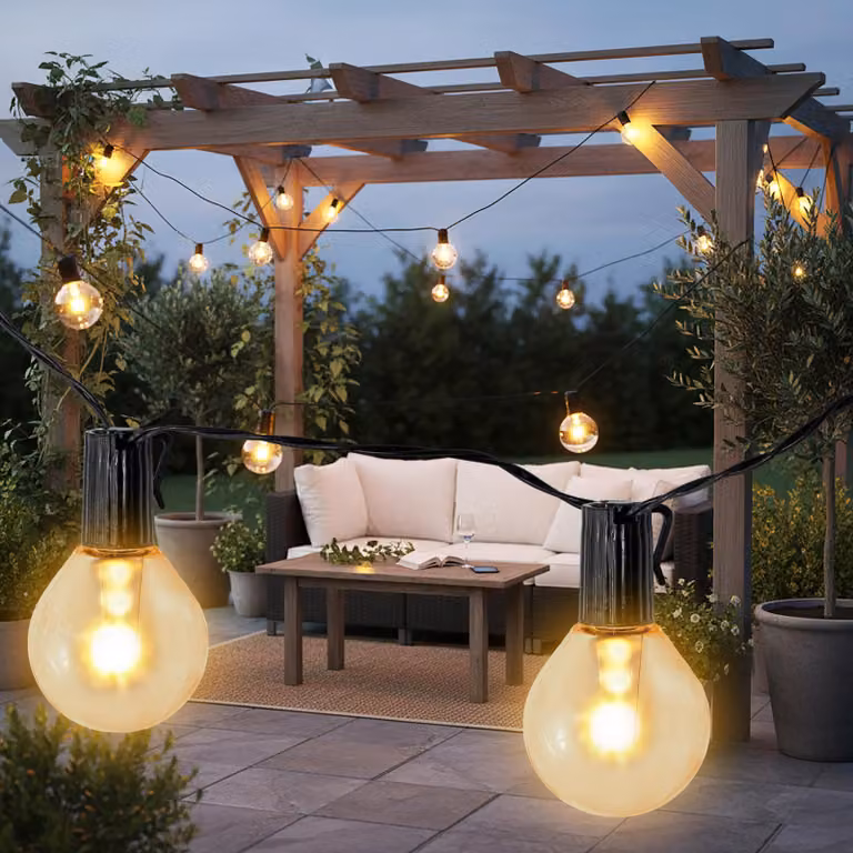 Guirnalda de luces LED solar Spetebo con 20 bombillas esféricas transparentes en color blanco cálido para iluminación decorativa exterior