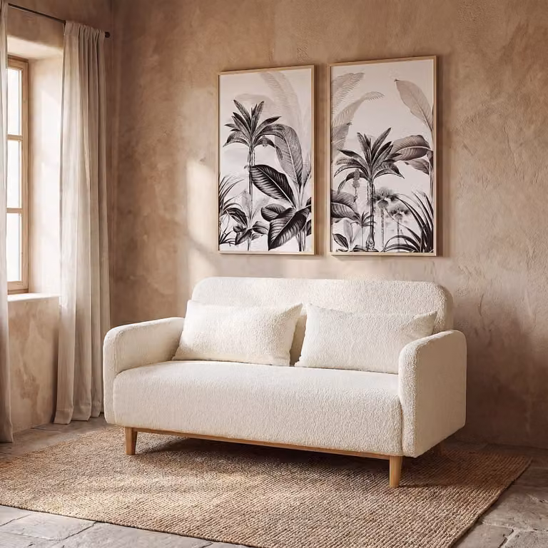 Sofá cama moderno de 2 o 3 plazas Maison du Monde en tela boucle color blanco con estructura de madera y An/P/Al: 190 x 140 cm