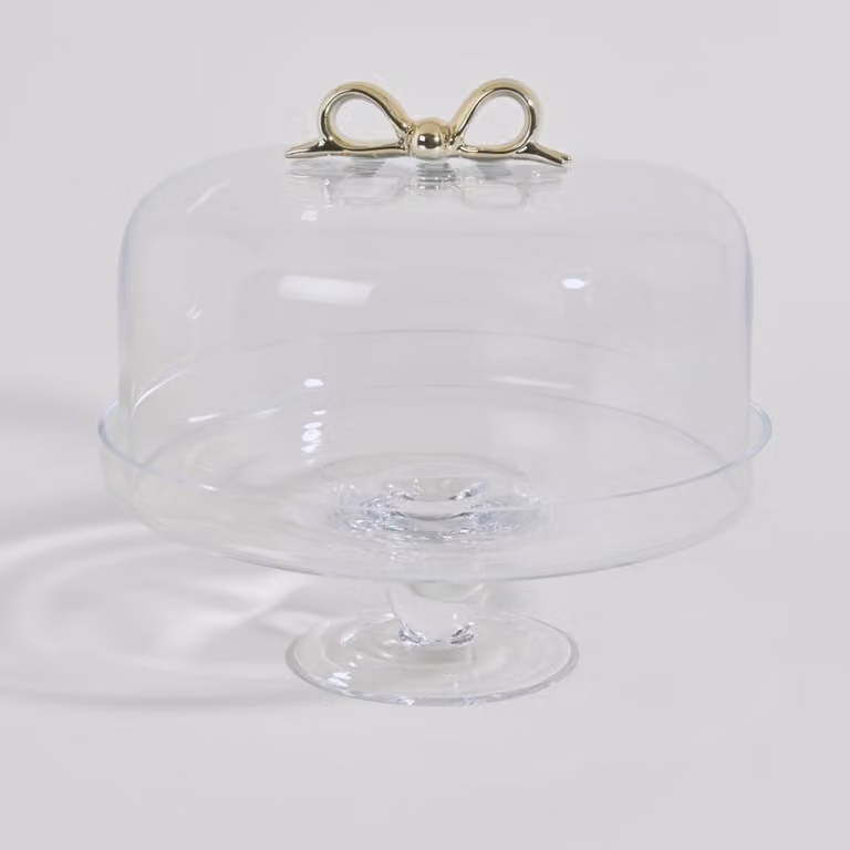 Campana para tarta redonda de vidrio transparente con lazo dorado de Maisons du Monde