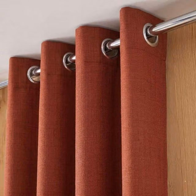 Cortina térmica opaca ORNAMI color naranja con ojales An/Al: 140 x 240 cm
