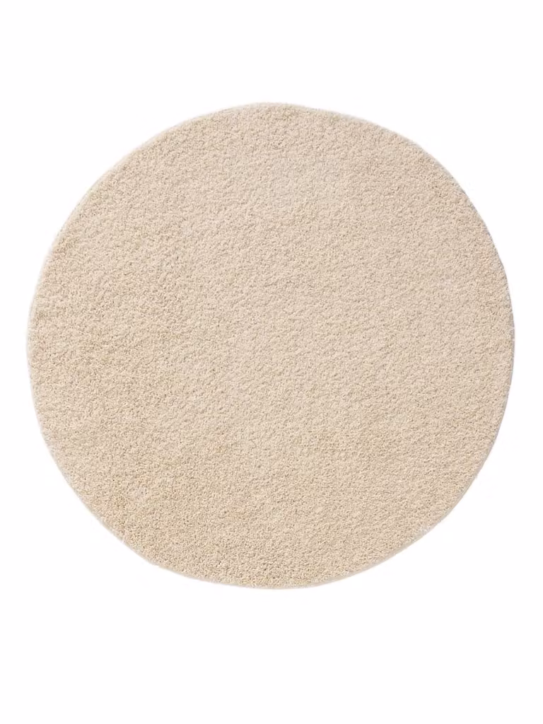 Alfombra redonda de pelo largo Benuta en color beige con un diámetro de 250 cm