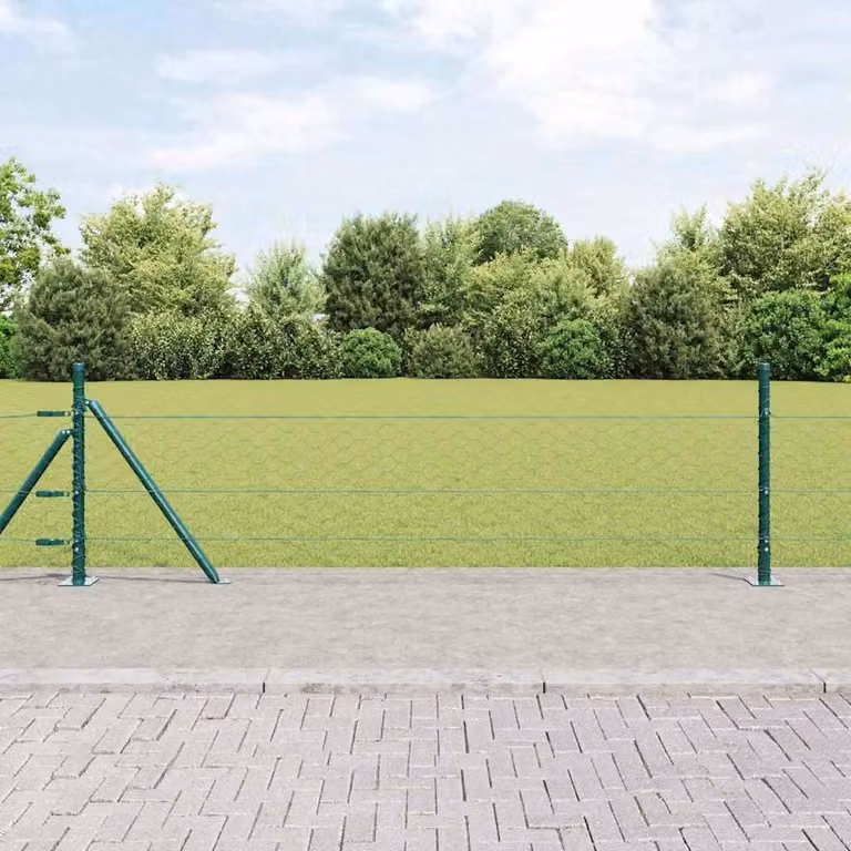 Valla de malla hexagonal Syfax verde con base de concreto para instalación en suelo