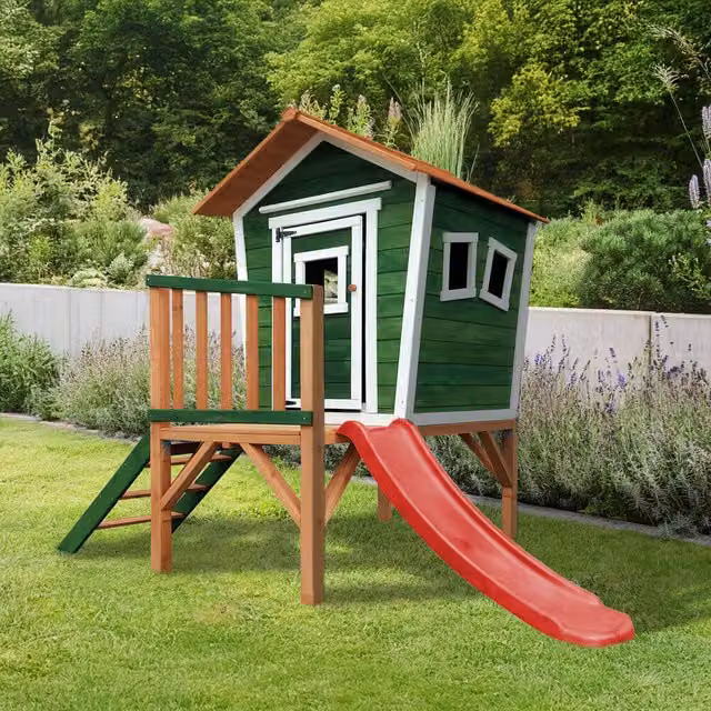 Casa de juegos Home Deluxe PINO sobre pilotes de madera con tobogán, color verde, An/P/Al: 242 x 193 x 171 cm